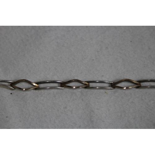 1021 - SILVER AND GOLD BRACELET MARKED 950 AND 18K IN TWO SEPARATE AREAS