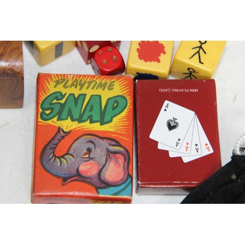 704 - LARGE QUANTITY OF PLAYING CARDS AND OTHER GAMES