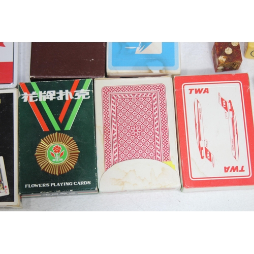 704 - LARGE QUANTITY OF PLAYING CARDS AND OTHER GAMES