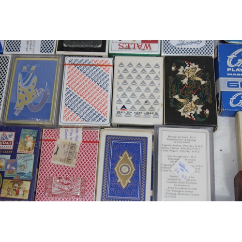 704 - LARGE QUANTITY OF PLAYING CARDS AND OTHER GAMES