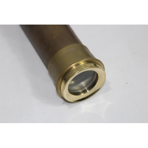 438 - NAUTICALIA BRASS TELESCOPE ON TRIPOD BASE