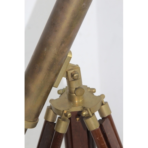 438 - NAUTICALIA BRASS TELESCOPE ON TRIPOD BASE