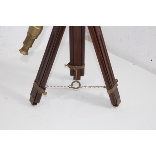 438 - NAUTICALIA BRASS TELESCOPE ON TRIPOD BASE