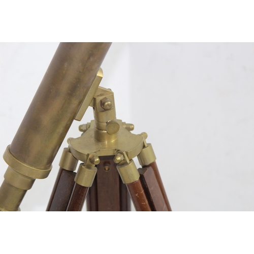 438 - NAUTICALIA BRASS TELESCOPE ON TRIPOD BASE