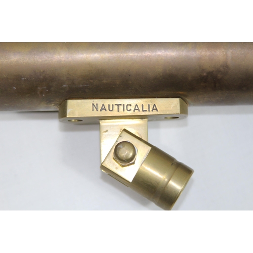 438 - NAUTICALIA BRASS TELESCOPE ON TRIPOD BASE