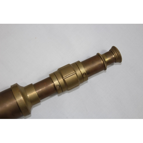 438 - NAUTICALIA BRASS TELESCOPE ON TRIPOD BASE
