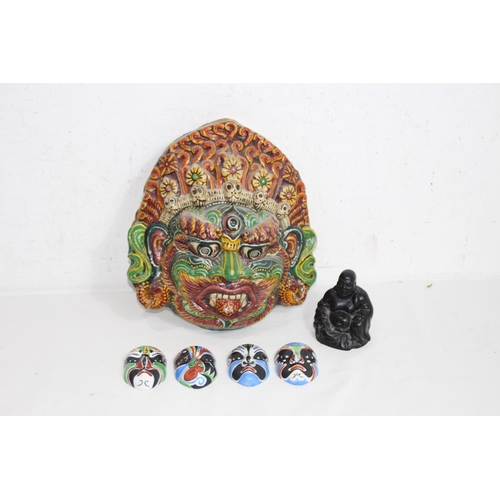 446 - QUANTITY OF VINTAGE EASTERN MASKS AND BUDDA
30 X 25CM