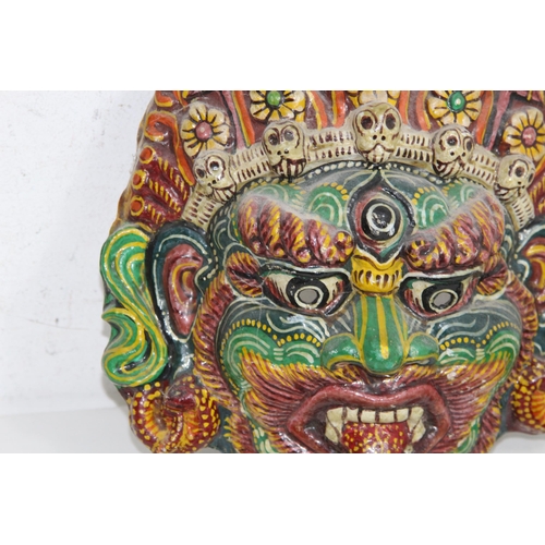 446 - QUANTITY OF VINTAGE EASTERN MASKS AND BUDDA
30 X 25CM