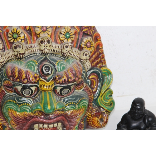 446 - QUANTITY OF VINTAGE EASTERN MASKS AND BUDDA
30 X 25CM
