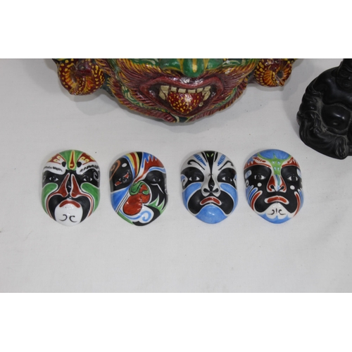 446 - QUANTITY OF VINTAGE EASTERN MASKS AND BUDDA
30 X 25CM