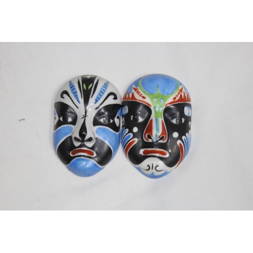 446 - QUANTITY OF VINTAGE EASTERN MASKS AND BUDDA
30 X 25CM