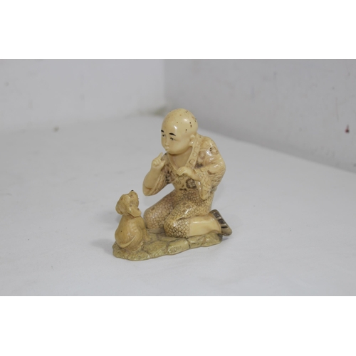 456 - OPIUM PIPE AND SMALL CHINESE FIGURE AND BOWL
25CM