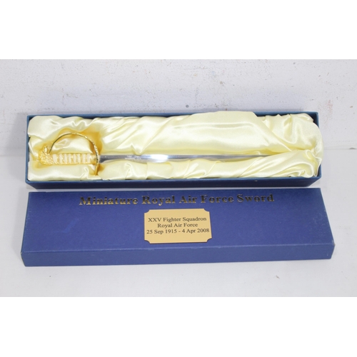 776 - MINIATURE ROYAL AIR FORCE SWORD
20CM