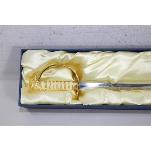 776 - MINIATURE ROYAL AIR FORCE SWORD
20CM