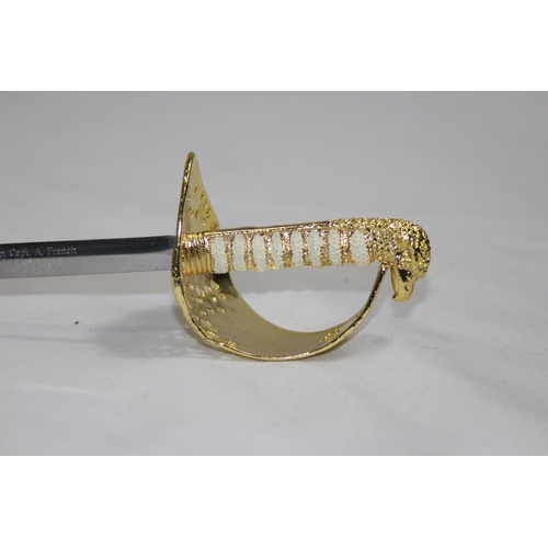 776 - MINIATURE ROYAL AIR FORCE SWORD
20CM