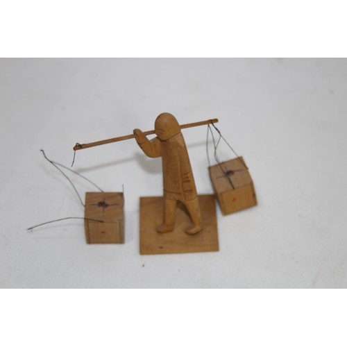 469 - QUANTITY OF WOODEN CARVED MOVING MODELS ETC 
15 X 14CM