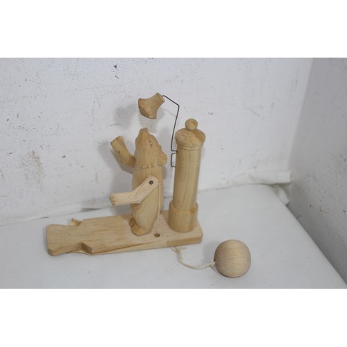 469 - QUANTITY OF WOODEN CARVED MOVING MODELS ETC 
15 X 14CM