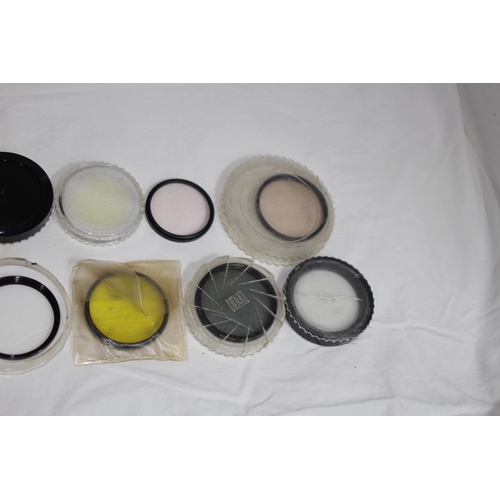 722 - QUANTITY OF CASED CAMERA EQUIPMENT INCLUDING CANON CAMERA AND VARIOUS LENSES ETC