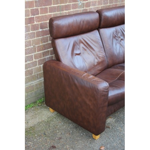52 - BROWN LEATHER EKORNES THREE SEATER SOFA 
216 X 77 X 100CM