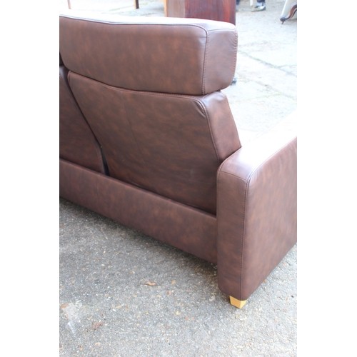 52 - BROWN LEATHER EKORNES THREE SEATER SOFA 
216 X 77 X 100CM