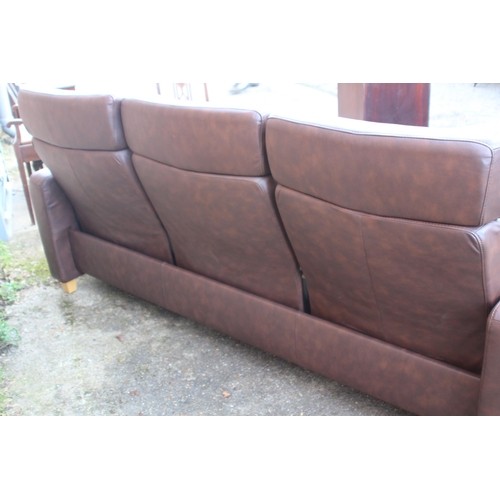 52 - BROWN LEATHER EKORNES THREE SEATER SOFA 
216 X 77 X 100CM