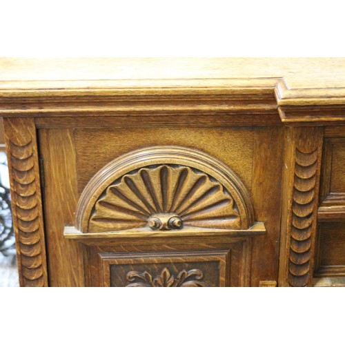 11 - EDWARDIAN HEAVILY CARVED SIDEBOARD WITH LEAD LINED CUPBOARD
181 X 54 X 129CM