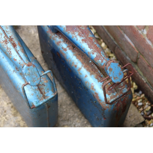 557 - 4 X PETROL CANS INCLUDING MILITARY