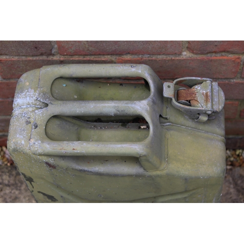 557 - 4 X PETROL CANS INCLUDING MILITARY