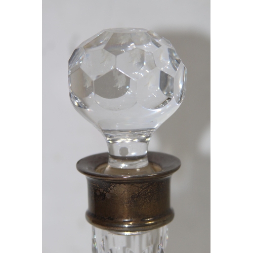 1071 - PAIR OF SILVER COLLARED DECANTERS