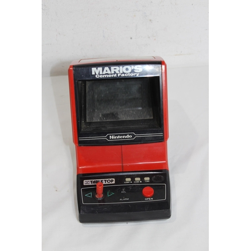 601 - NINTENDO 1983 MARIOS CEMENT FACTORY GAME AND A BOXED SONY WALKMAN