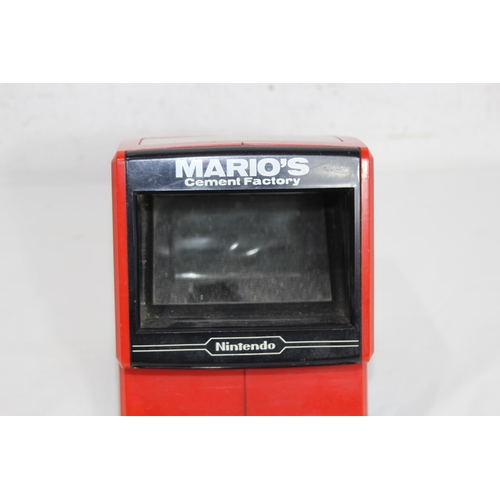 601 - NINTENDO 1983 MARIOS CEMENT FACTORY GAME AND A BOXED SONY WALKMAN