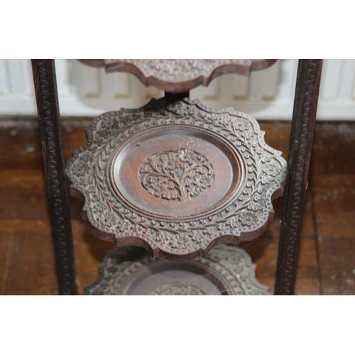 29 - ANTIQUE EASTERN CARVED CAKE STAND 
81 X 26CM