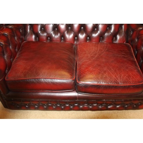 76 - HIGH BACK LEATHER OX BLOOD TWO SEATER CHESTERFIELD SOFA
136 X 90 X 91CM