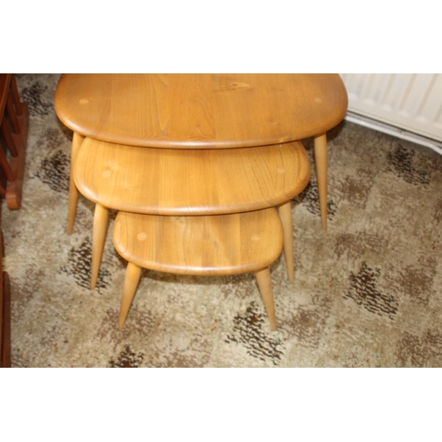 24 - MID CENTURY BLONDE ERCOL PEBBLE NEST 
66 X 44 X 40CM