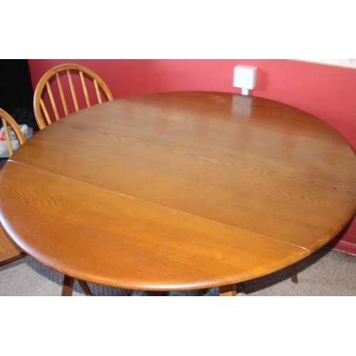 26 - MID CENTURY DROP LEAF DINING TABLE AND FOUR ERCOL HOOP BACK CHAIRS
125 X 113 X 70CM SHUT 63CM