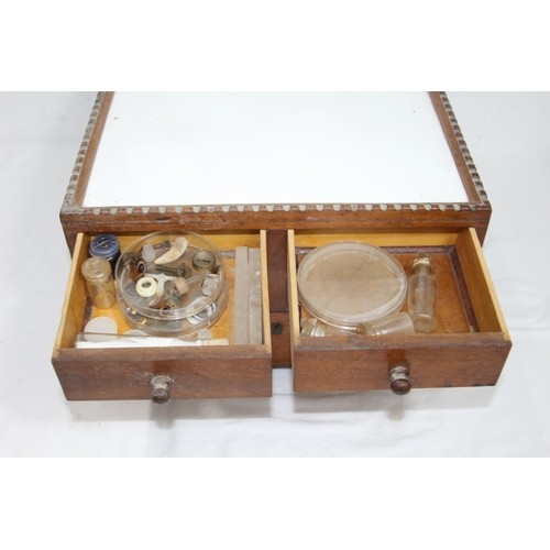 390 - INTERESTING VINTAGE DENTISTRY CABINET DOUBLE SIDED WITH LARGE AMOUNT OF CONTENTS 
36 X 36 X 23CM