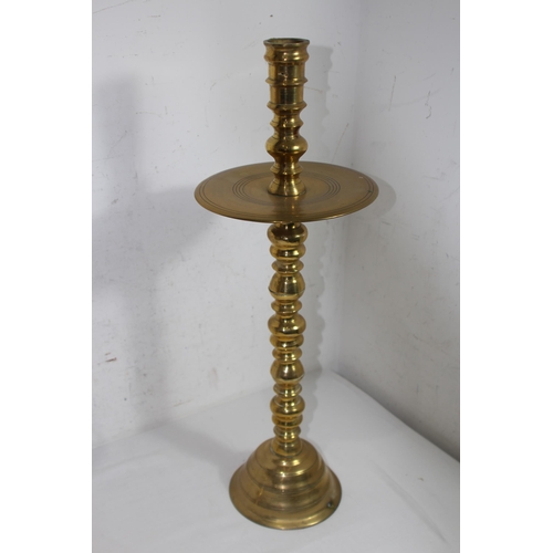 221 - PAIR OF LARGE BRASS CHURCH CANDLE STICKS  
59CM