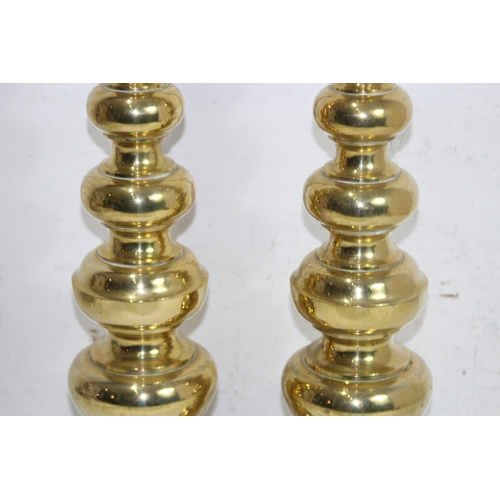 222 - PAIR OF BRASS CANDLE STICKS 
62CM