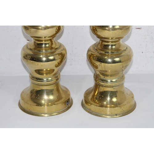 222 - PAIR OF BRASS CANDLE STICKS 
62CM