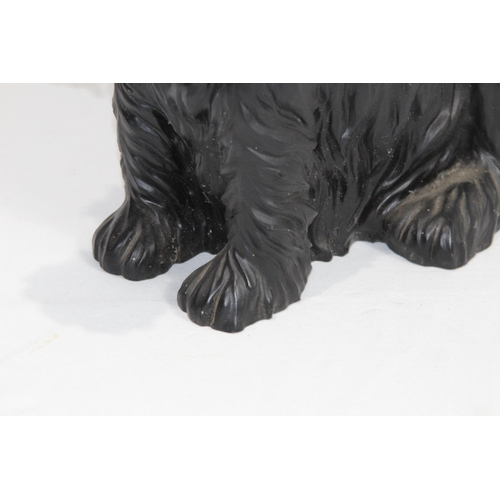 299 - RESIN FIGURE OF A WESTIE SCOTTIE DOG
35 X 38CM