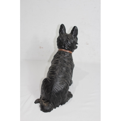 299 - RESIN FIGURE OF A WESTIE SCOTTIE DOG
35 X 38CM