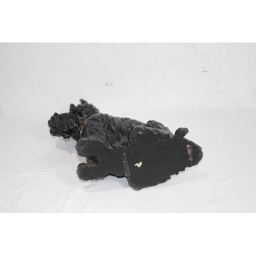 299 - RESIN FIGURE OF A WESTIE SCOTTIE DOG
35 X 38CM