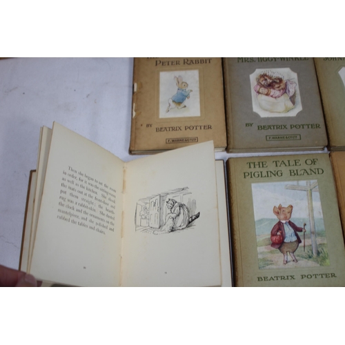 395 - BEATRICE POTTER PETER RABBIT BOOK SHELF AND CONTENTS
28 X 28 X 13CM