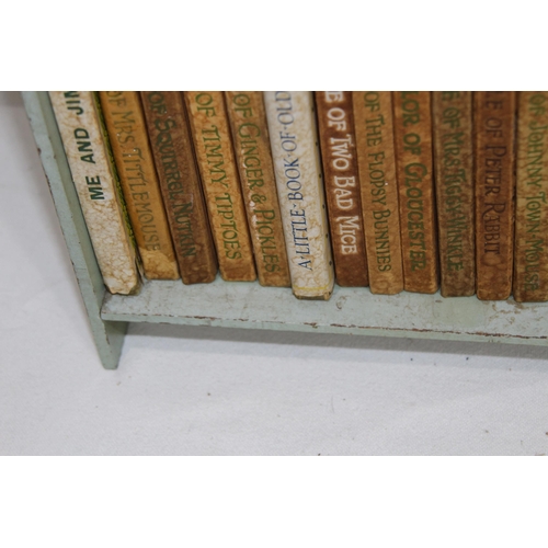 395 - BEATRICE POTTER PETER RABBIT BOOK SHELF AND CONTENTS
28 X 28 X 13CM