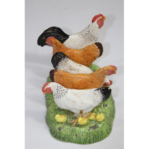 308 - 2 HEN EGG HOLDERS, JERSEY CREAMER AND A NOVELTY TOAST RACK
30 X 25CM