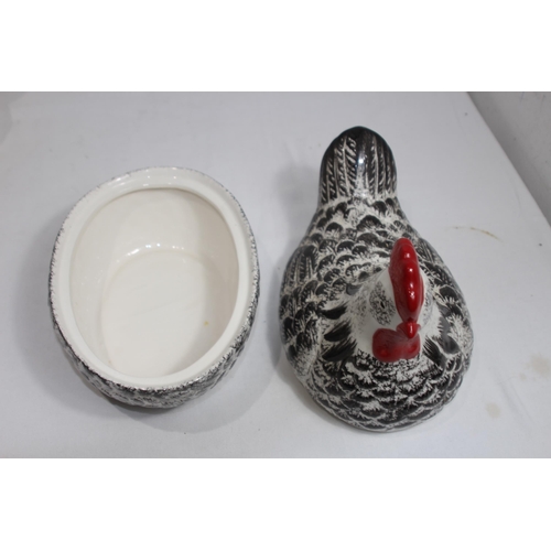 308 - 2 HEN EGG HOLDERS, JERSEY CREAMER AND A NOVELTY TOAST RACK
30 X 25CM