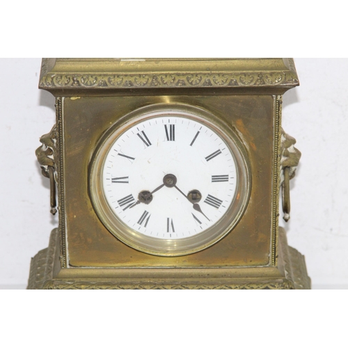 420 - ANTIQUE BRASS CLOCK
23 X 30 X 14CM