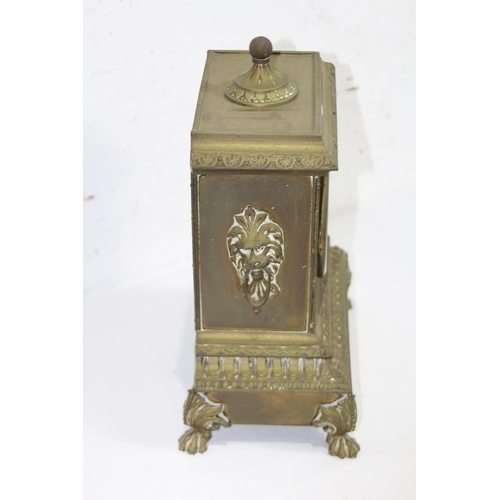 420 - ANTIQUE BRASS CLOCK
23 X 30 X 14CM