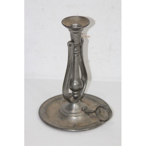 1035 - PEWTER PIVOTING CANDLE STICK
21 X 15CM