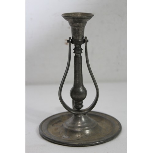 1035 - PEWTER PIVOTING CANDLE STICK
21 X 15CM